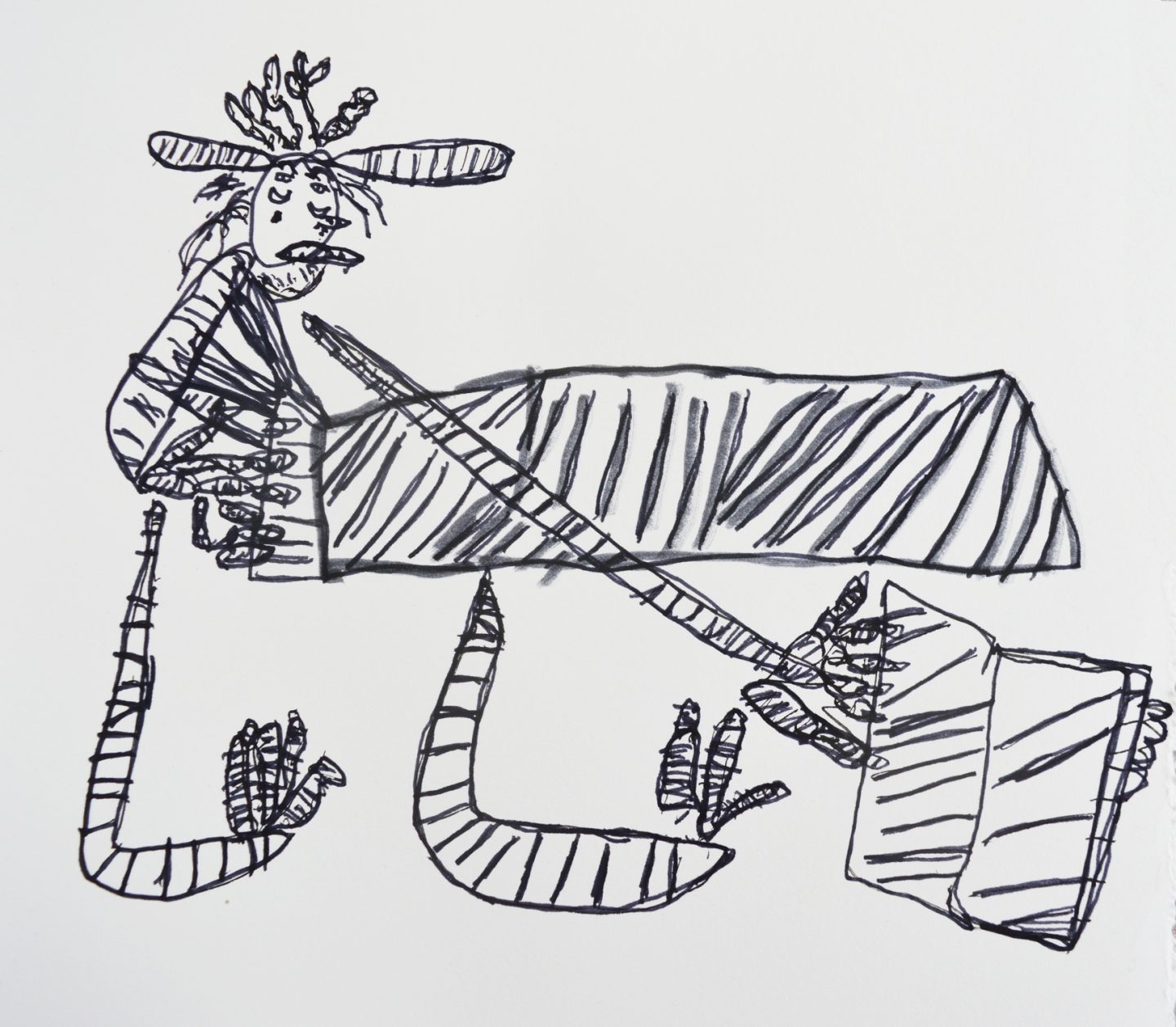 a reclining figure with a book, pen and ink