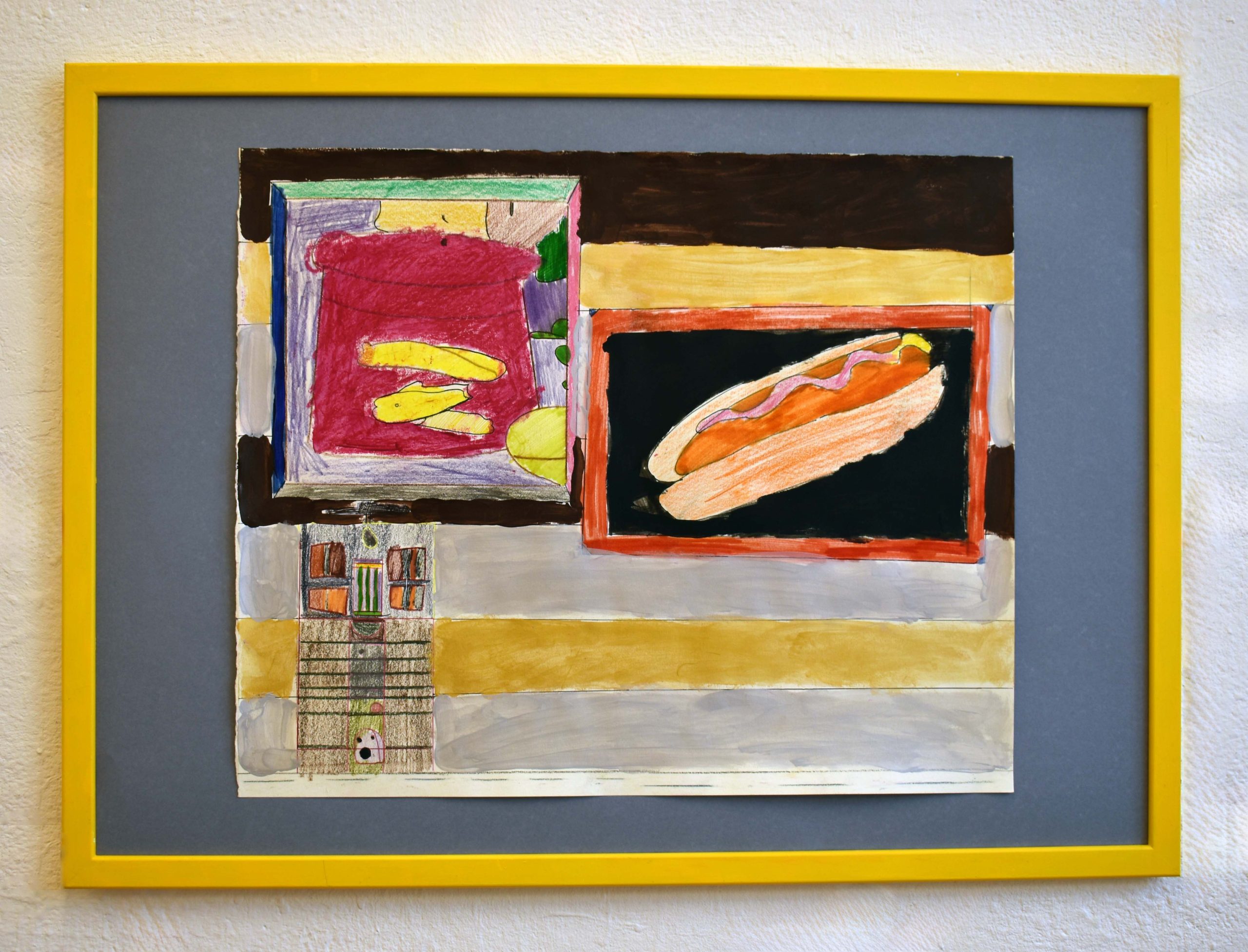An abstract painting in a yellow frame.