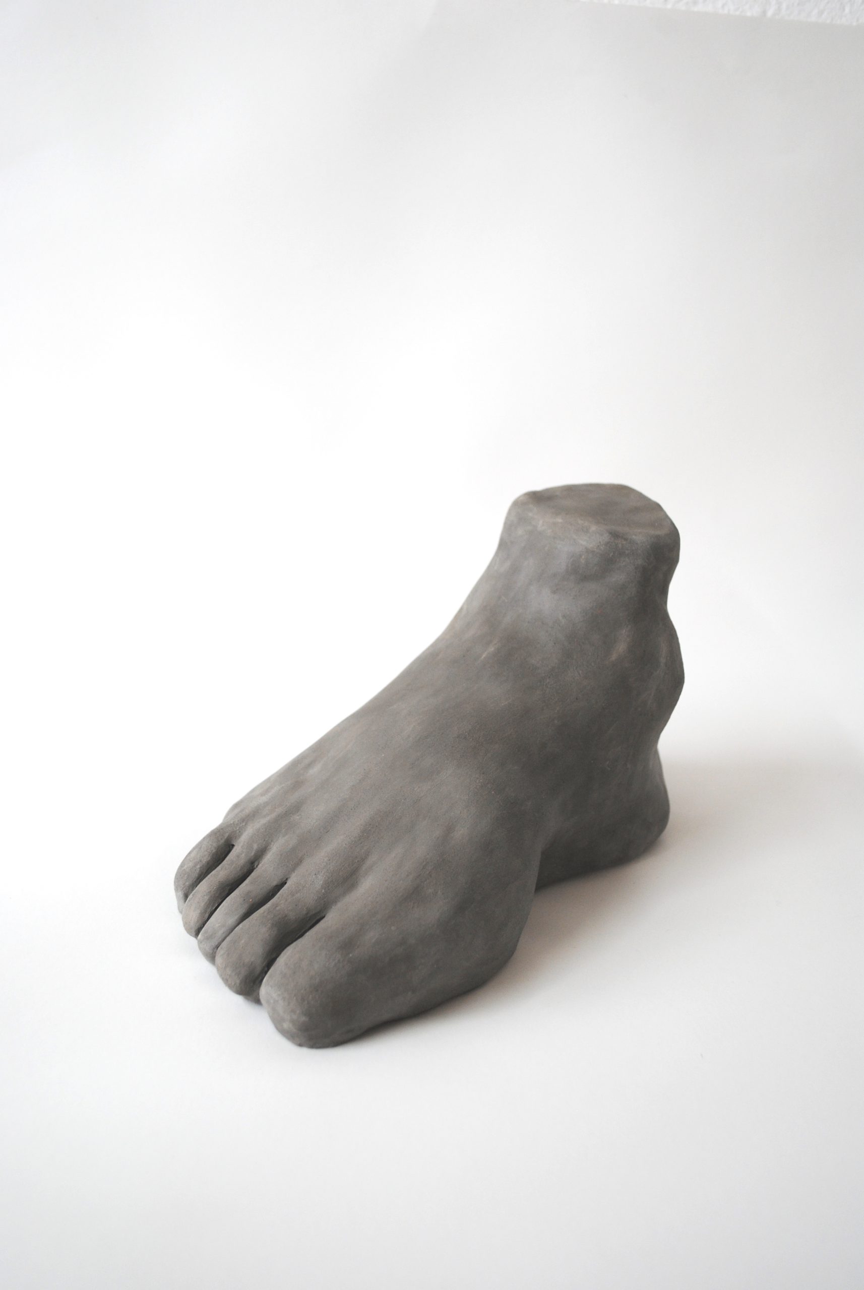A sculpture of a human foot.