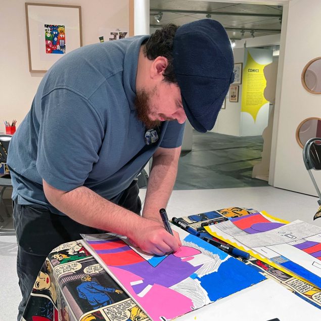 A man working on an artwork.