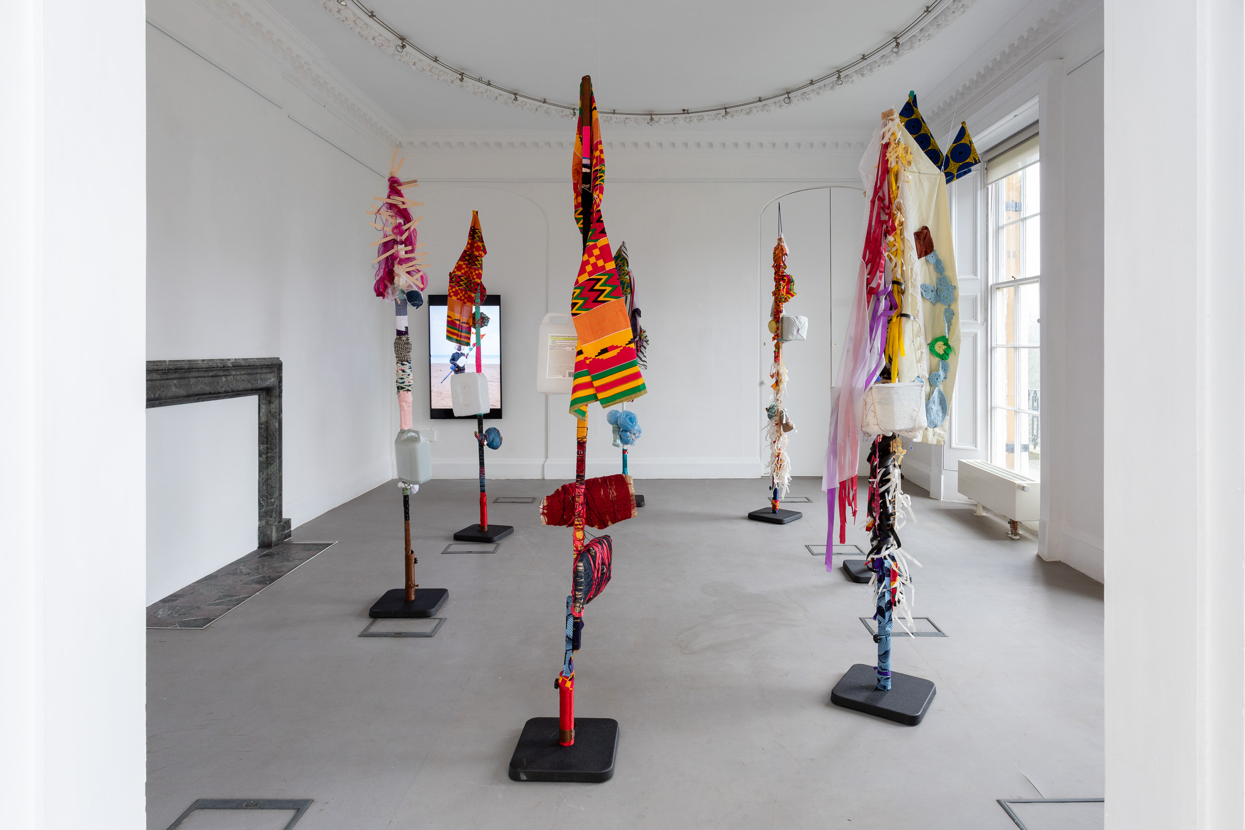 An installation of textiles sculptures in a gallery.