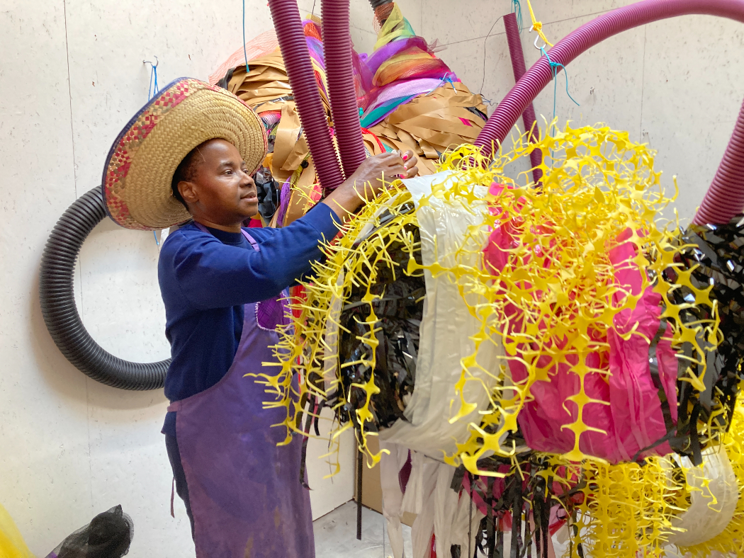 Nnena Kalu working on her art.