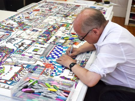Ian working on his commission 'A Journey Through Kingston', 2025