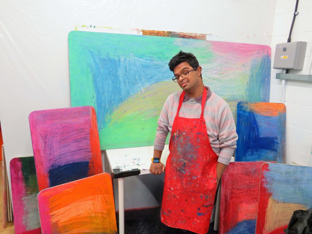Mohammed Imran Khan with his artwork.