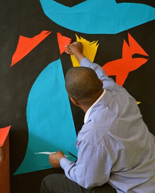 A man working on his art.
