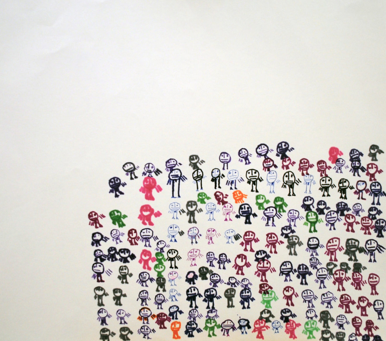 A group of small figures arranged in a grid formation forming a square to the bottom right of the paper.