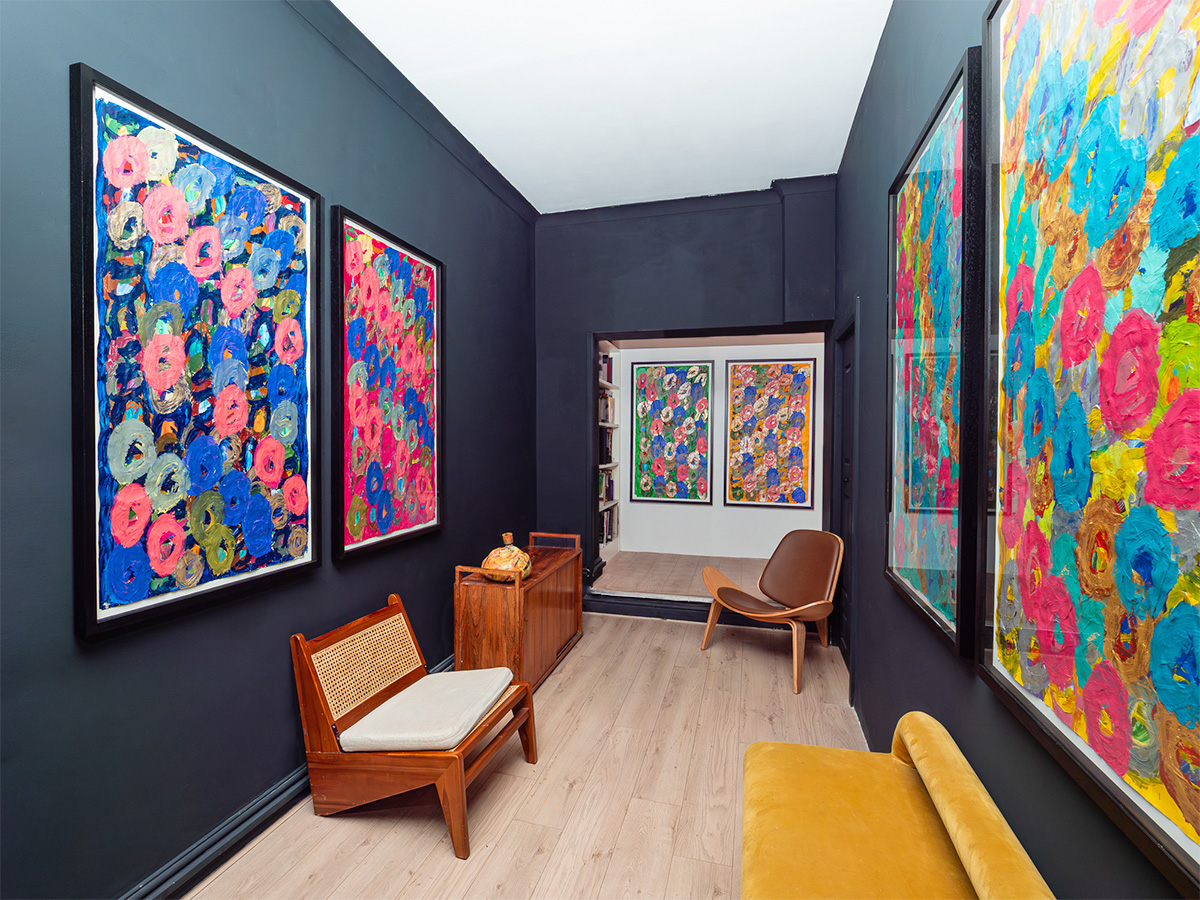 Installation view of six paintings by Kwaga Sillingi hanging at Sadie Sherman Gallery.