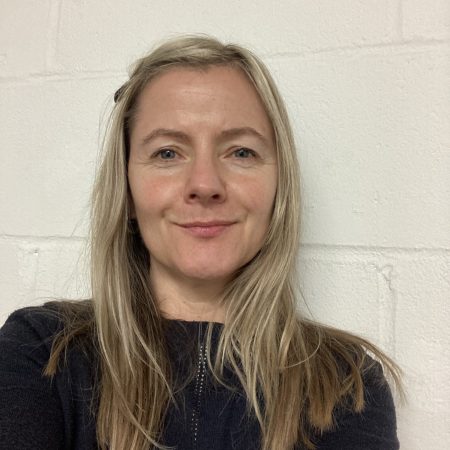 A picture of Lisa Brown. She is a white lady with long blonde hair and is wearing a dark coloured top.
