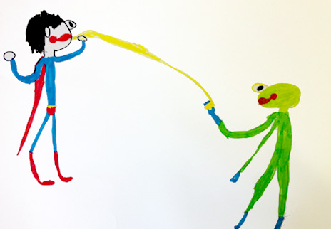 Superman fighting a green monster
