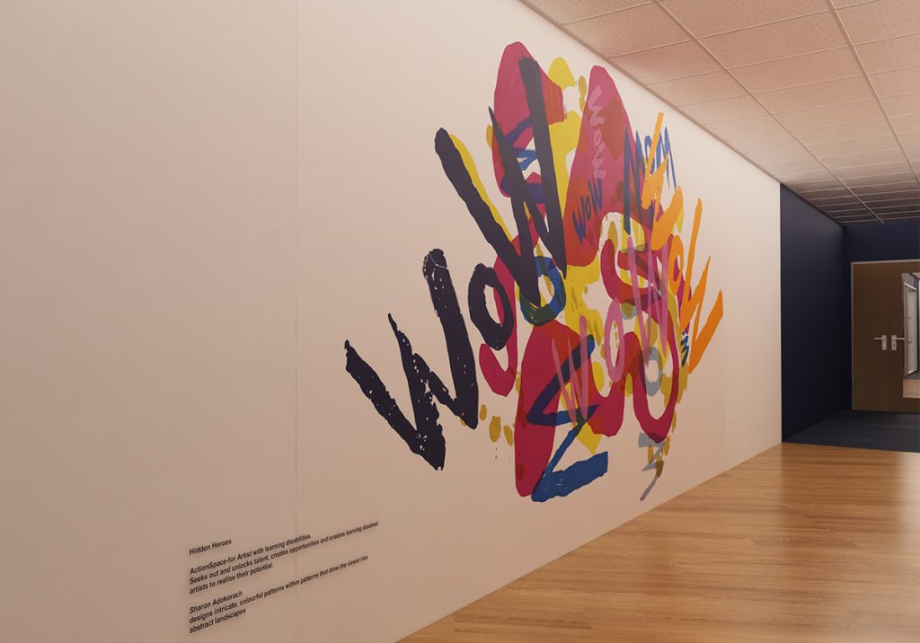 Sharon's work is printed onto a large white wall, showing colourful brushmarks.