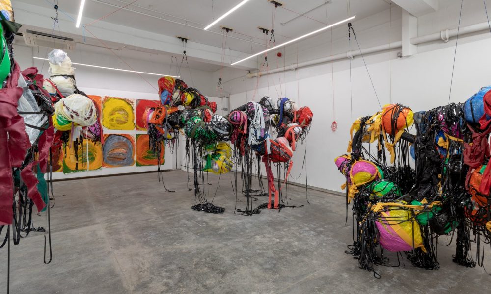 Nnena's sculptural work, suspended from the ceiling in a gallery space.