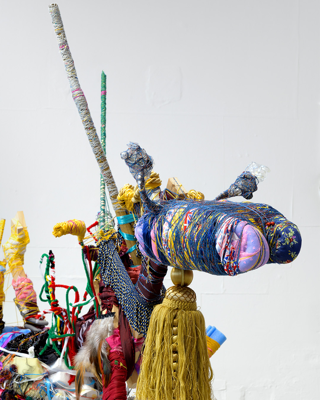 Andrew Omoding's artwork, a range of colourful fabric materials bound together.