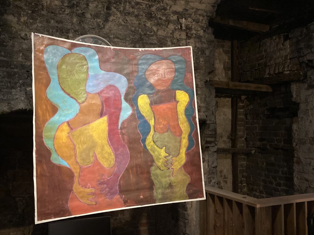 Robin Smith's work is displayed near a wall in a gallery.