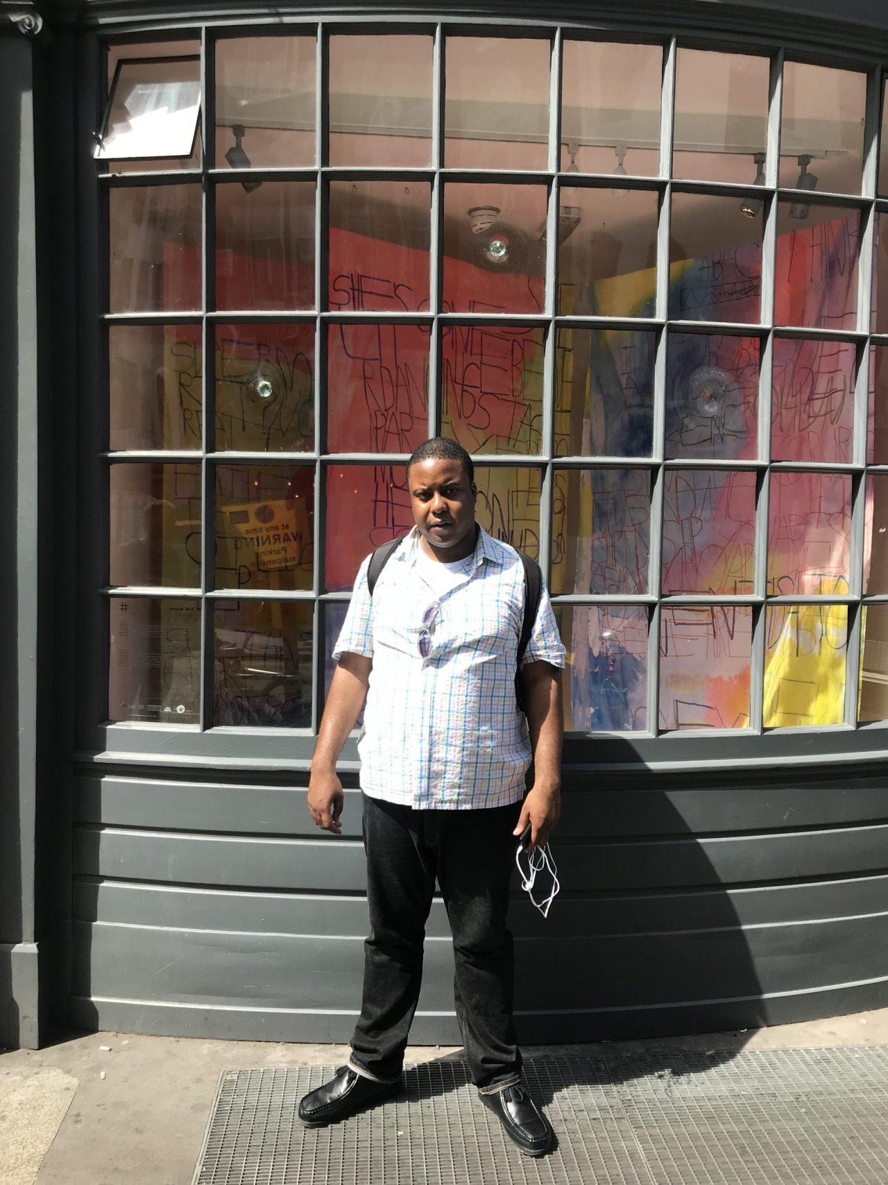 Artist Patrick Moses outside of his exhibition, 'Autocity', at The Smallest Gallery in Soho.