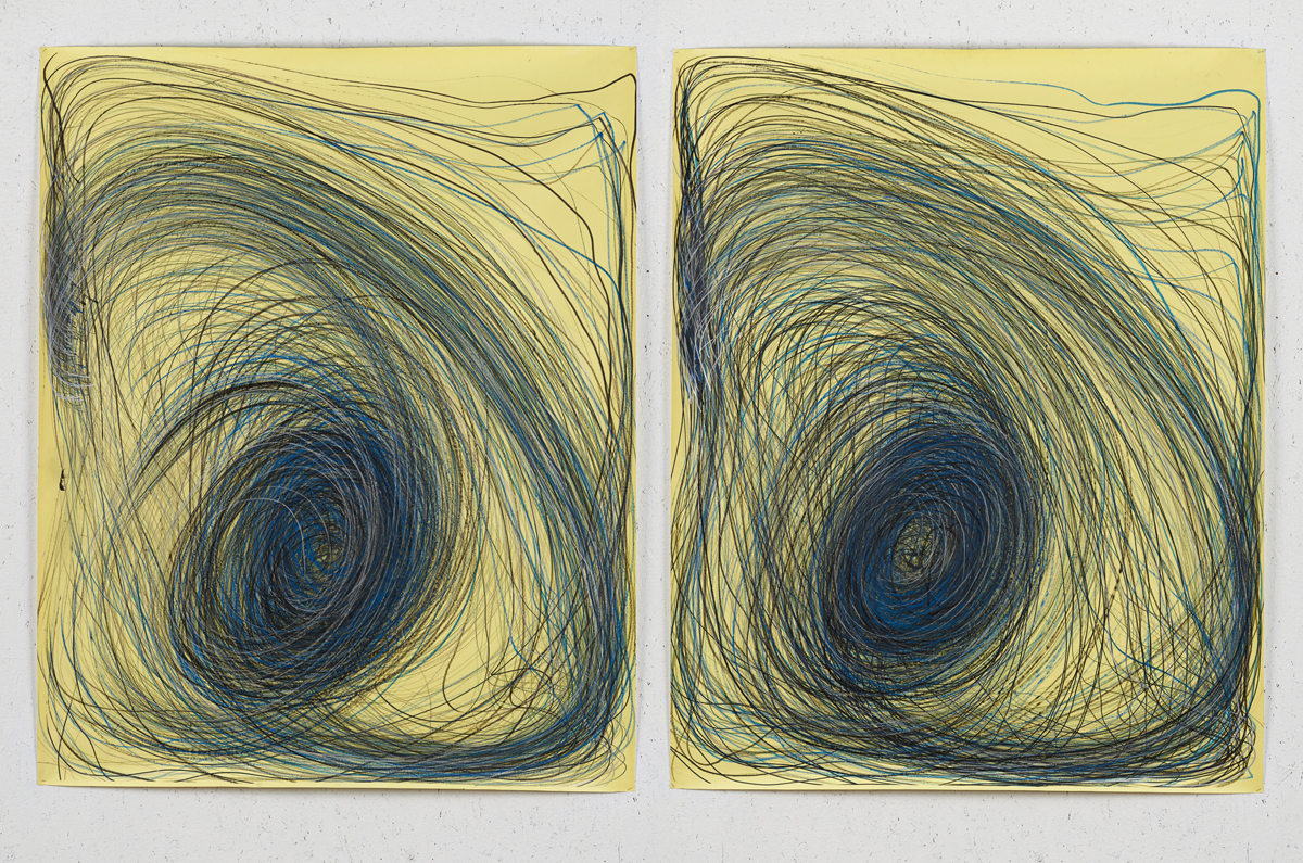 Two of Nnena Kalu's artworks next to each other on a wall, both showing repeated swirling marks on yellow paper.