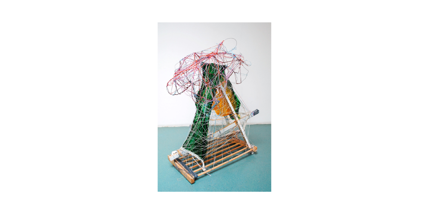 A multimedia sculpture using wire and assemblage, shaped like triangular prism.