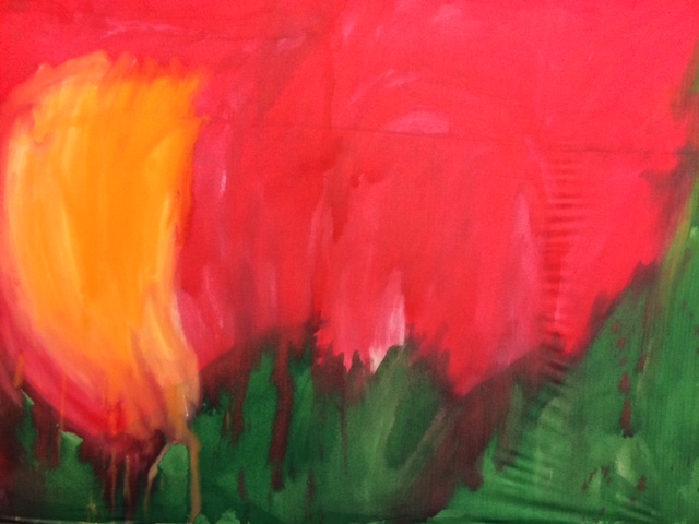 A red, geen and orange abstract variegated wash painting.