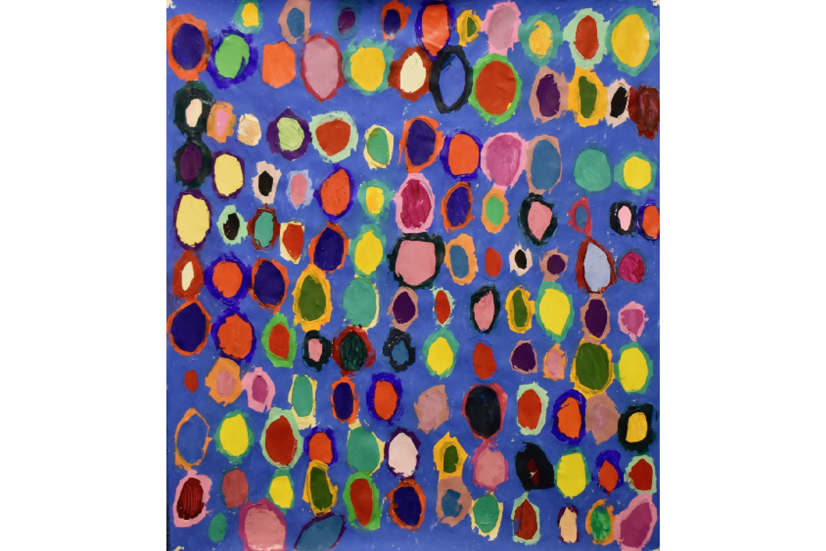 A painting on an ultramarine blue background, with many colourful nested circles.