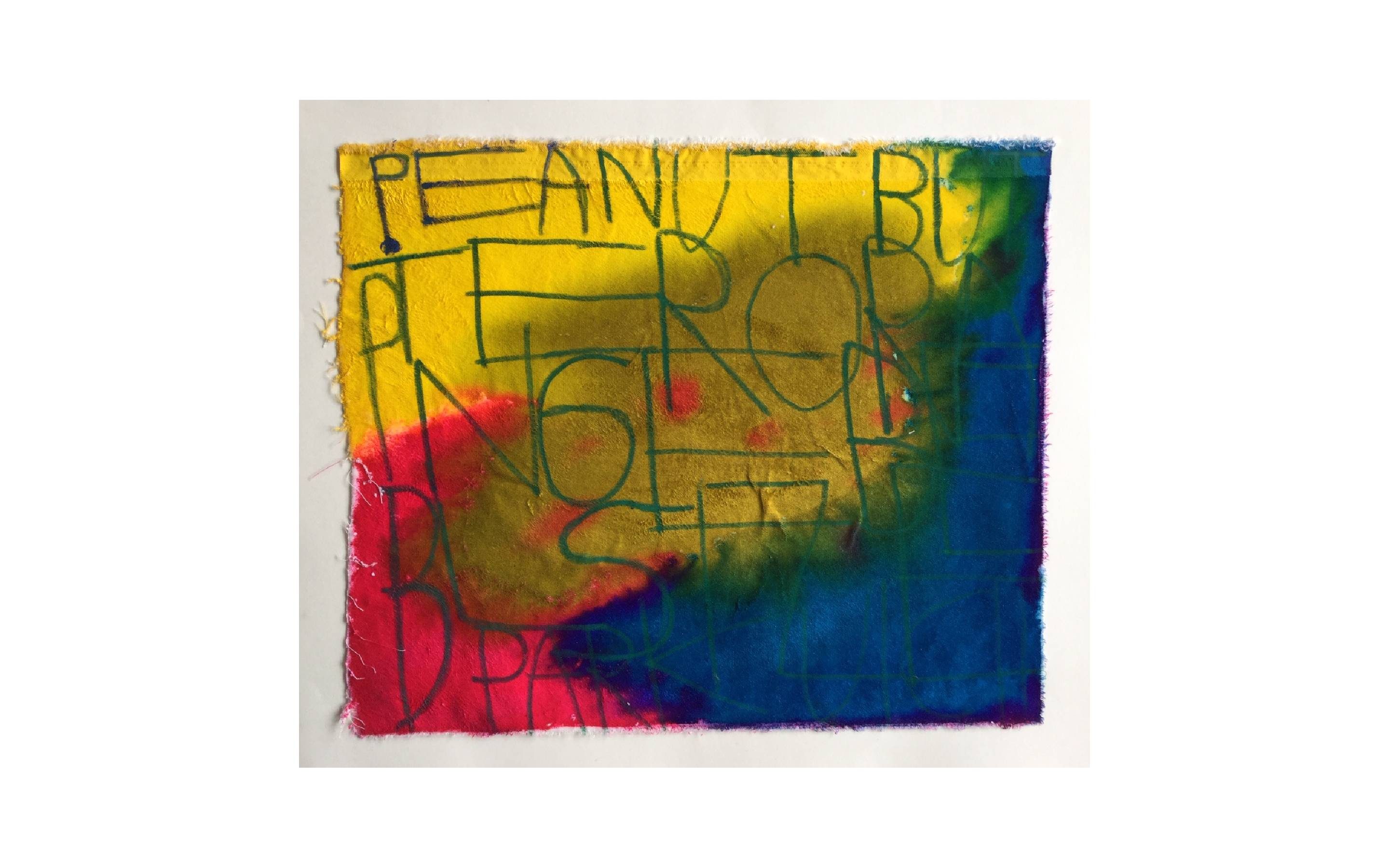 Rectangle shaped fabric coloured with bright inks that bleed into one another. Text written on top of the ink.